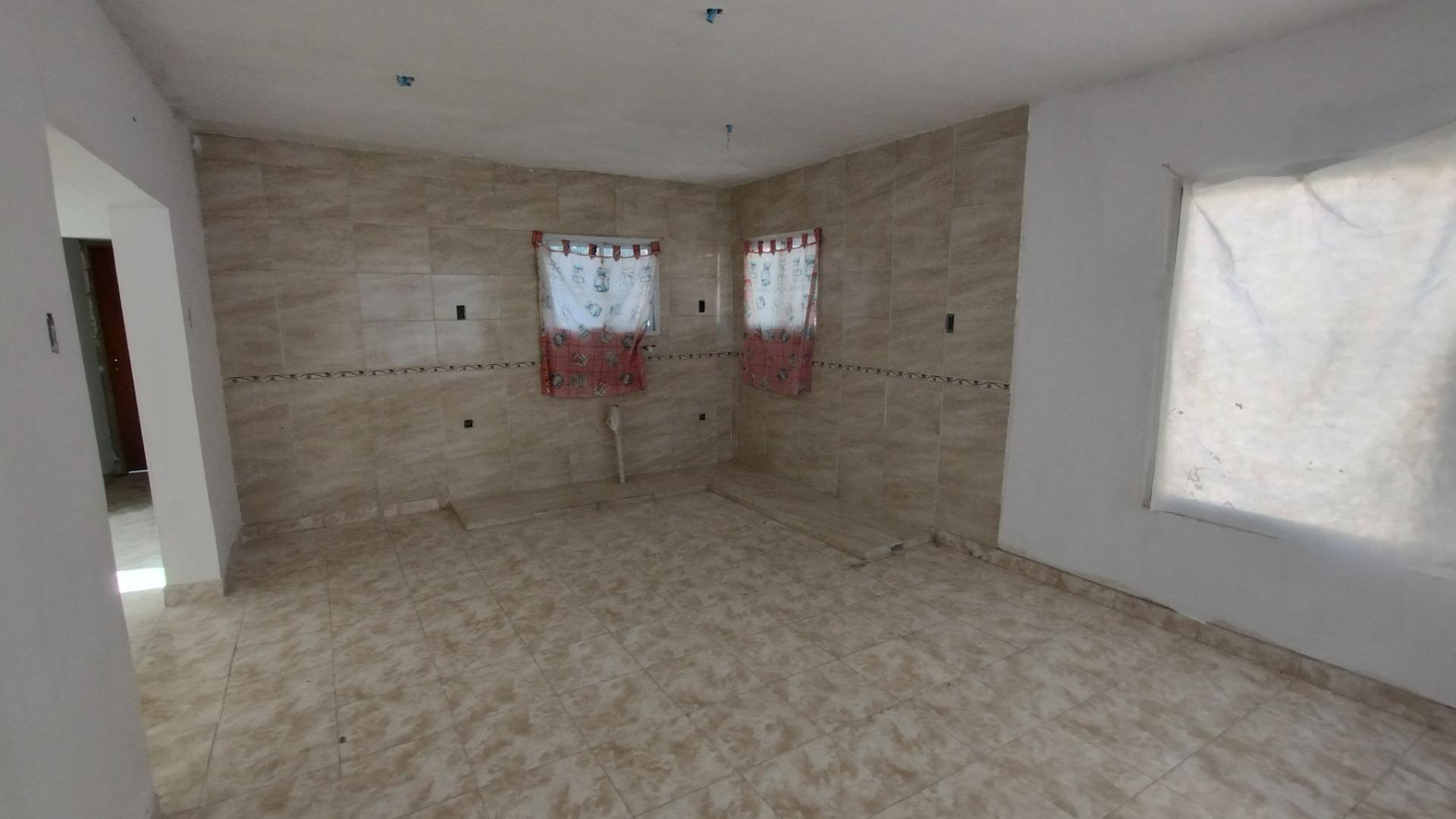 Casa 2 ambientes con 1 baño