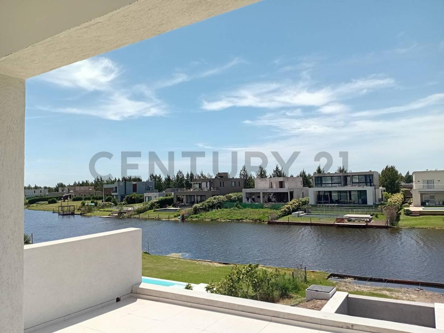 Casa moderna a la laguna en venta El Naudir, Puertos Canton a estrenar 5 ambientes