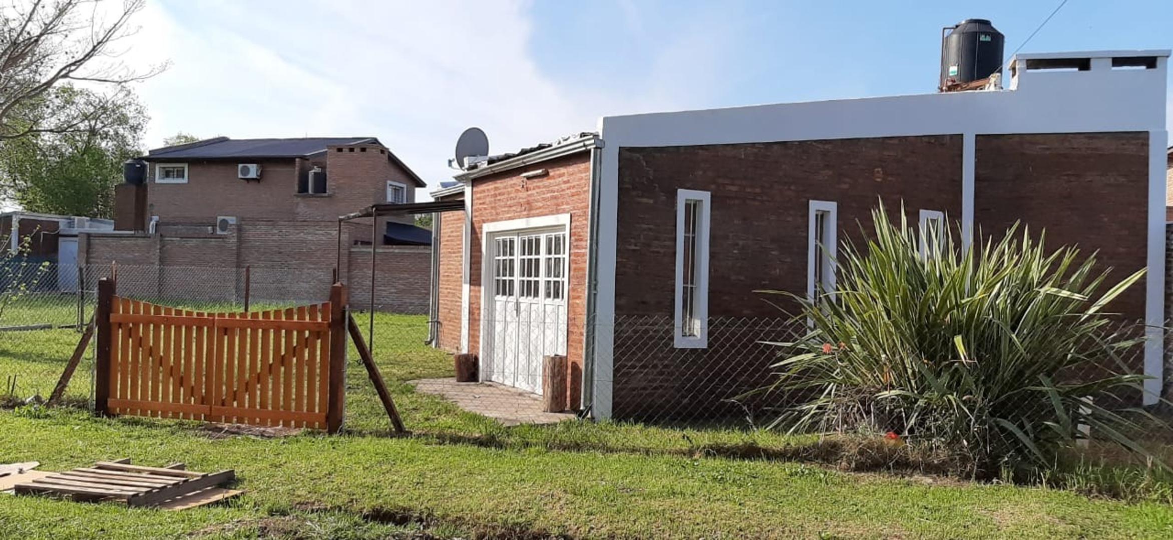 VENTA DE CASA MAS EXCELENTE LOTE EN ROLDAN