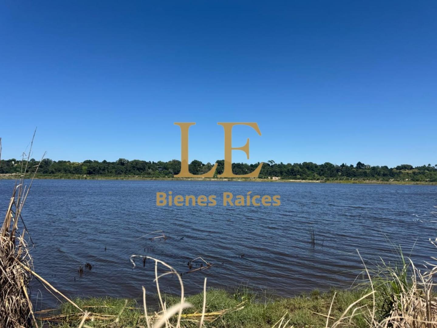 VENTA LOTE AL RIO CON AMARRA