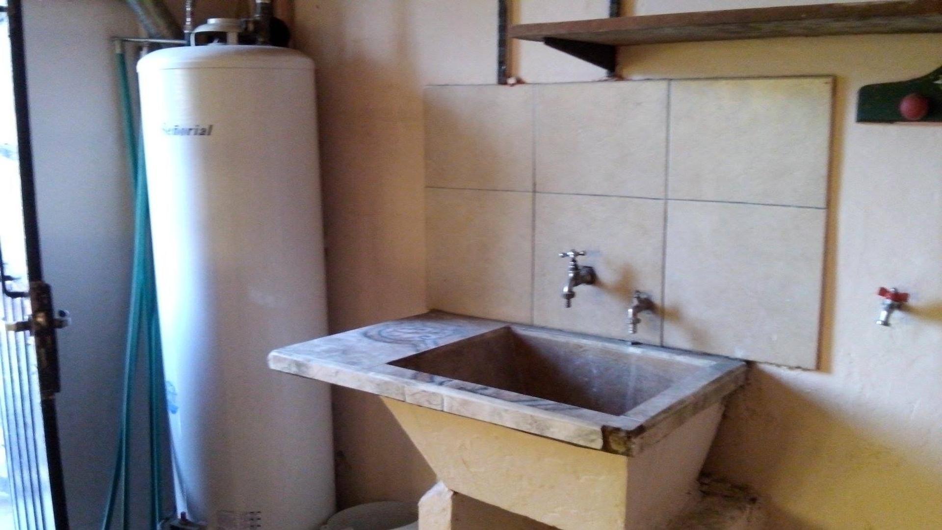 casa PH  3 ambientes garage con local