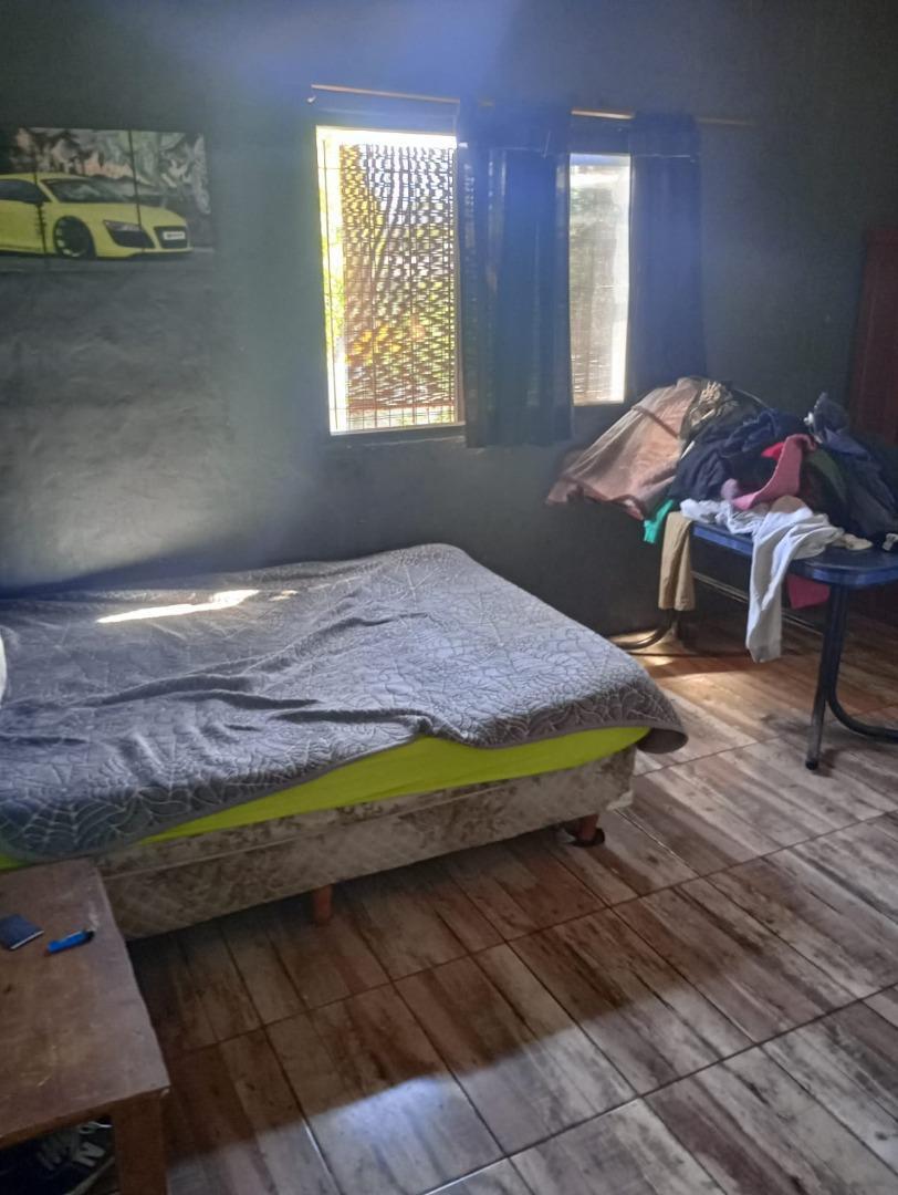 Casa y departamento con cochera y pileta