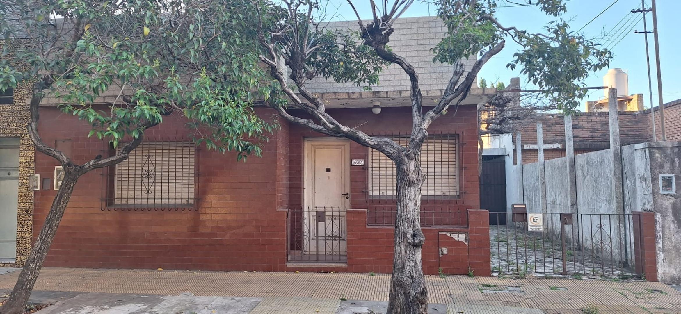 galpon con casa con techo de losa en olivos - Zona industria