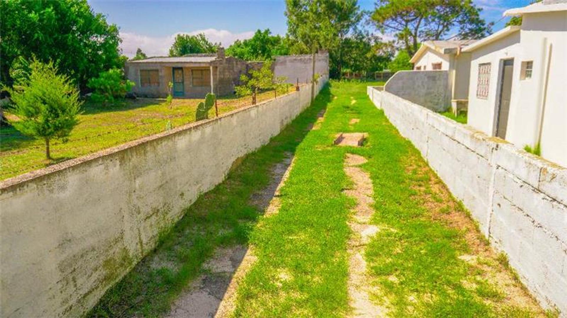 Vivienda 2 Dormitorios. Amplio Terreno 701m²