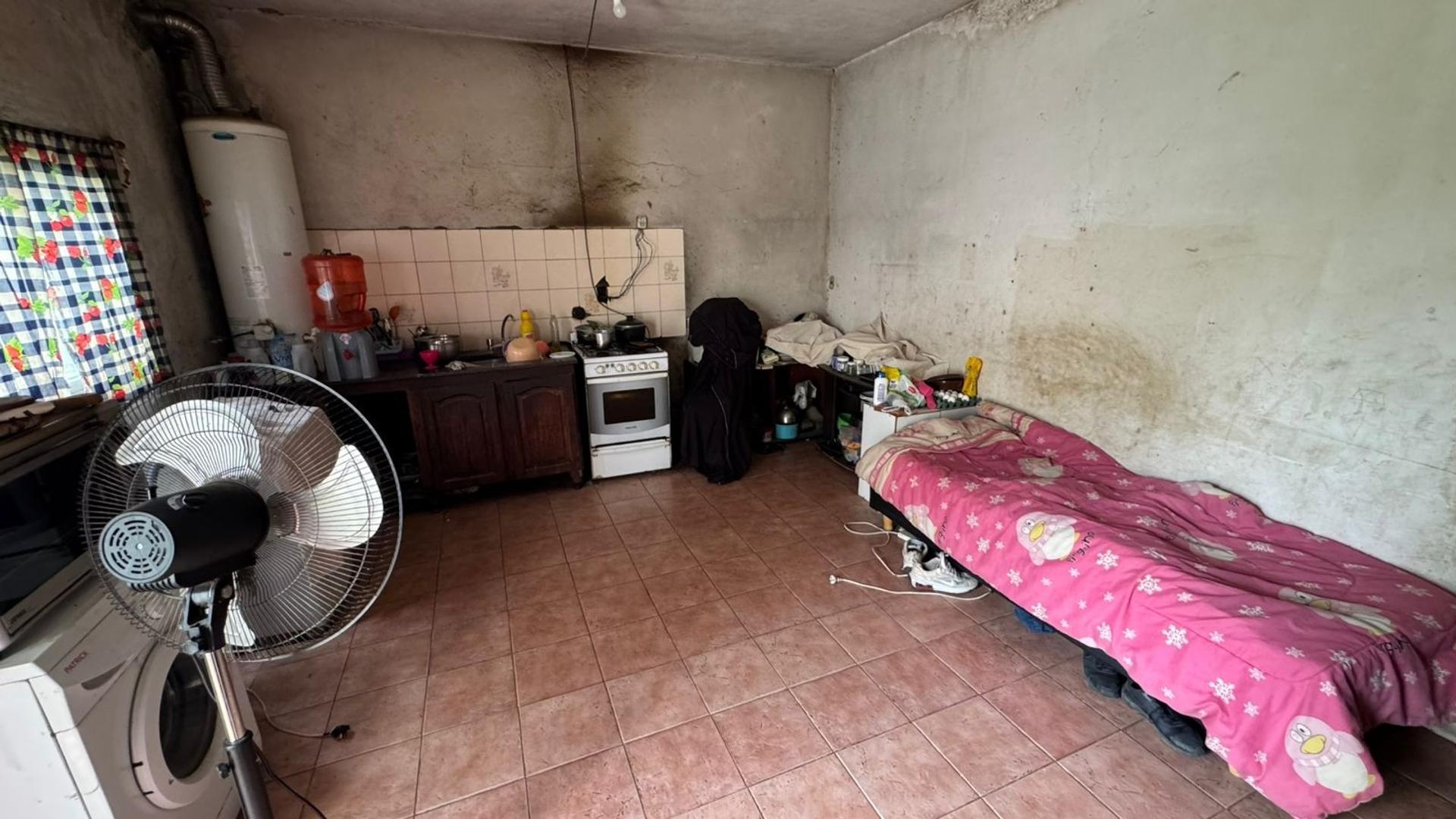 CASA EN VENTA – FRENTE A PLAZA – VILLA DE MAYO