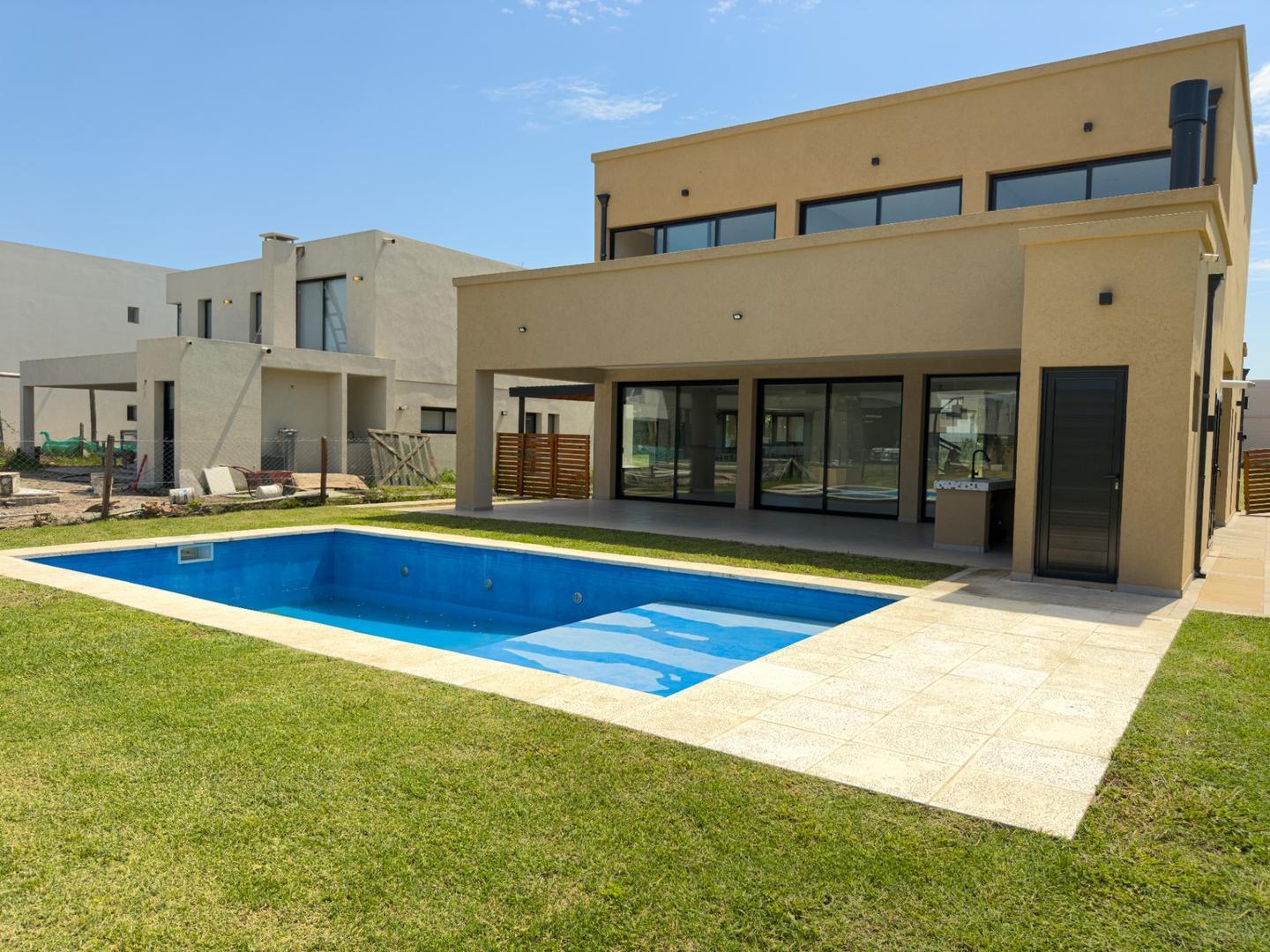 CASA 4 AMBIENTES BARRIO LAGOON PILAR VENTA