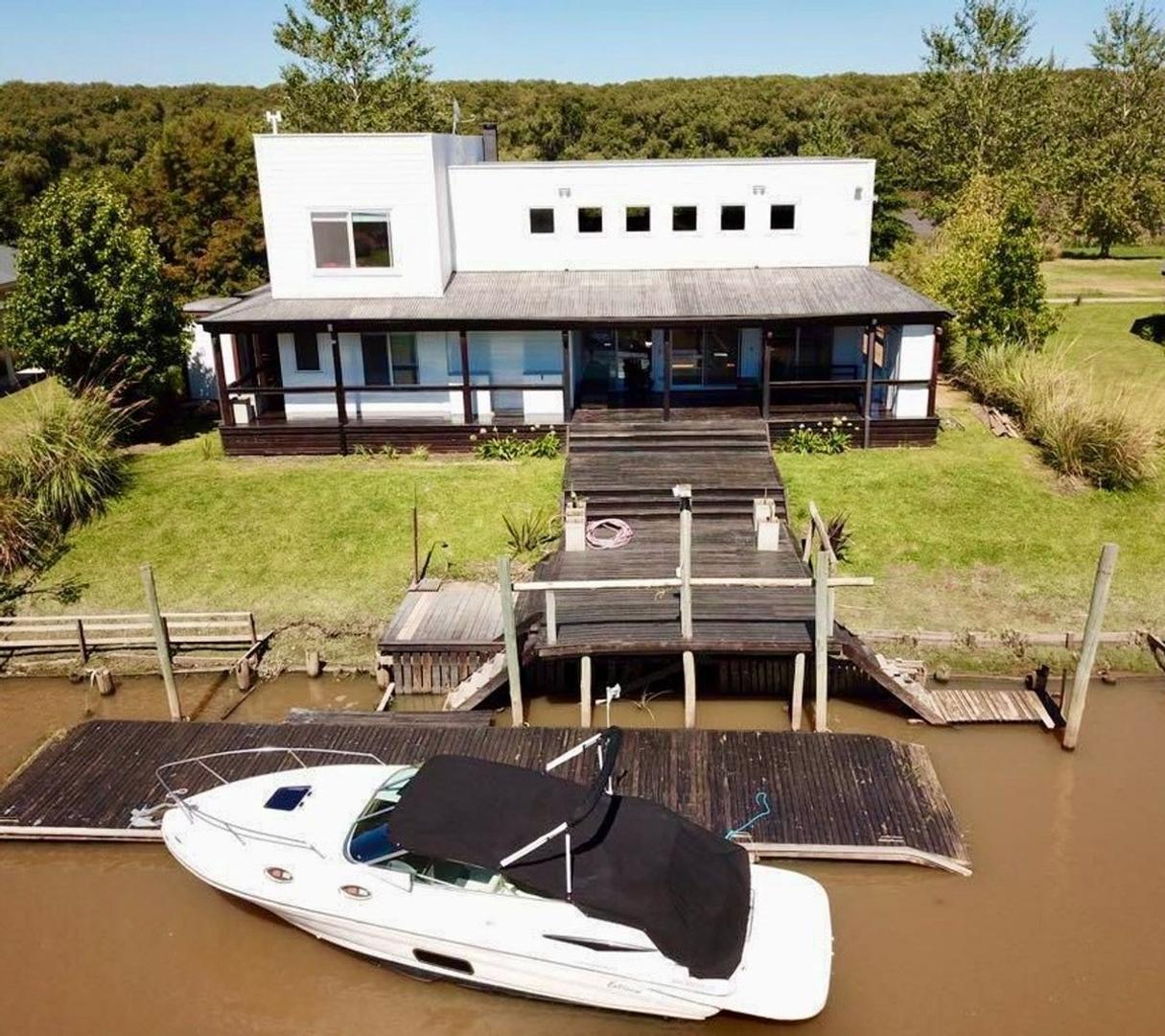 CASA 5 AMB VENTA EN ISLA DEL ESTE.QUINCHO AMARRA
