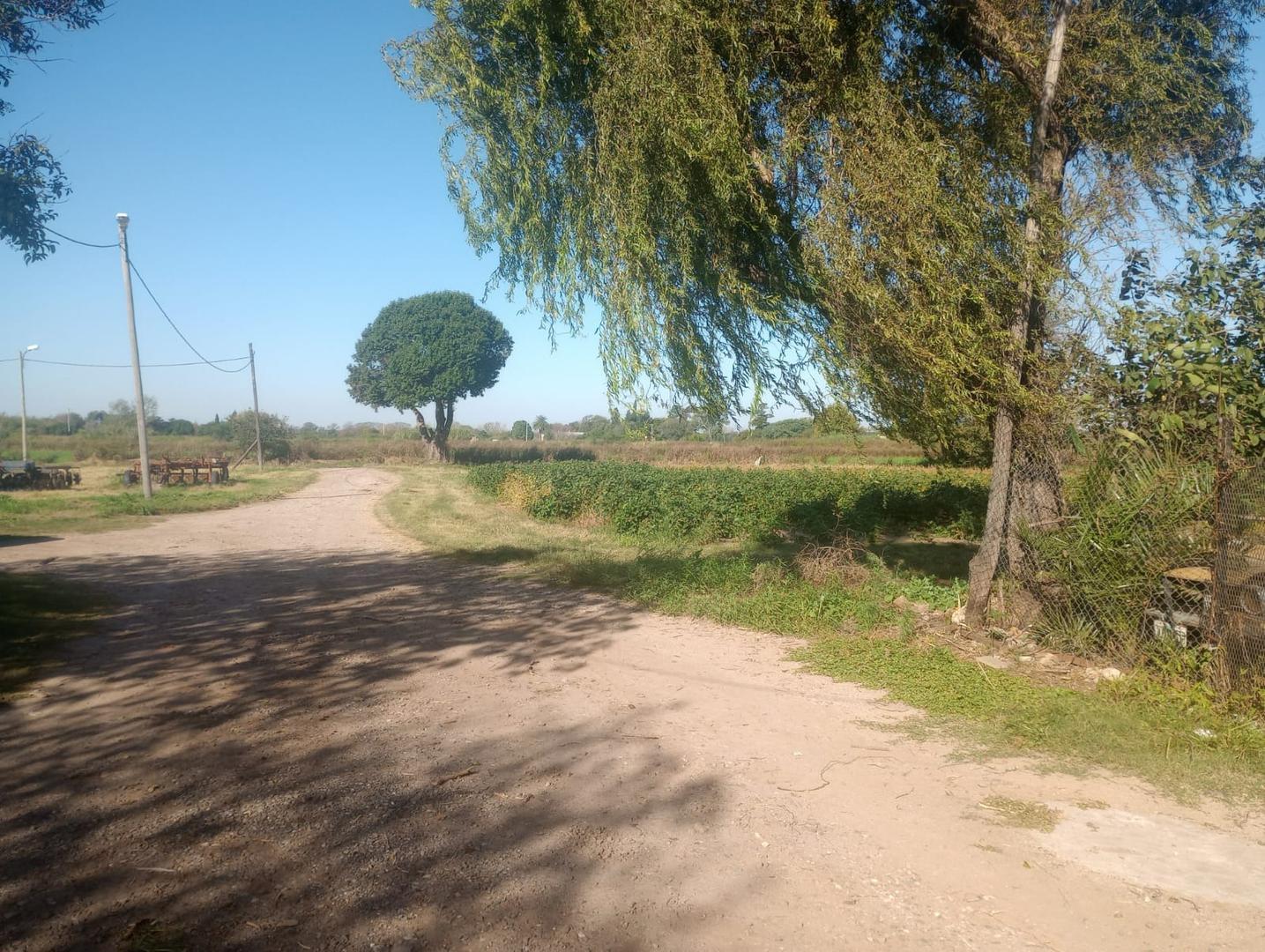 Venta Terreno con construcción camino a San Carlos