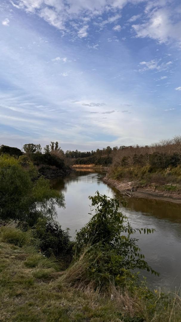 TERRENO CON CASA  A TERMINAR EN CARCARAES
