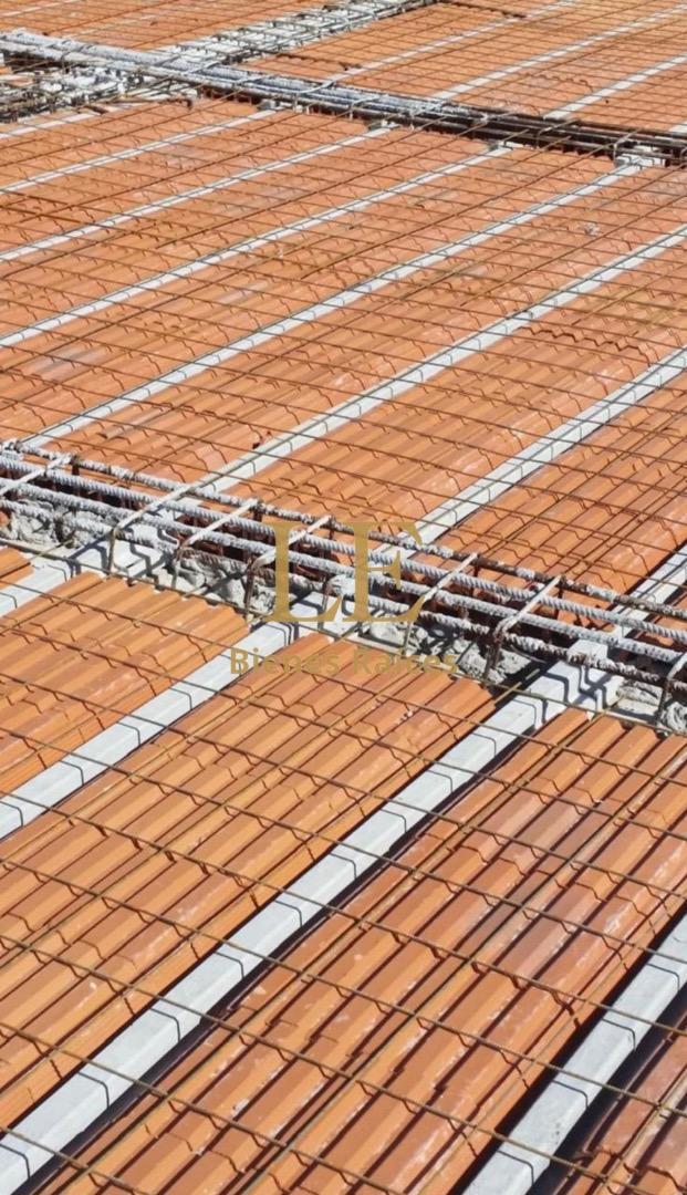 Terreno con propiedad a terminar en Loma Verde