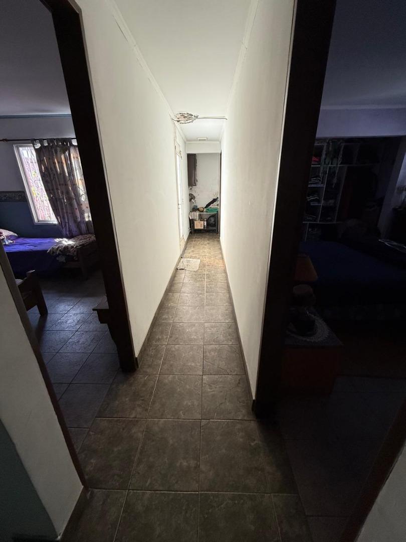 TIPO CASA 2 DORMITORIOS PATIO TERRAZA