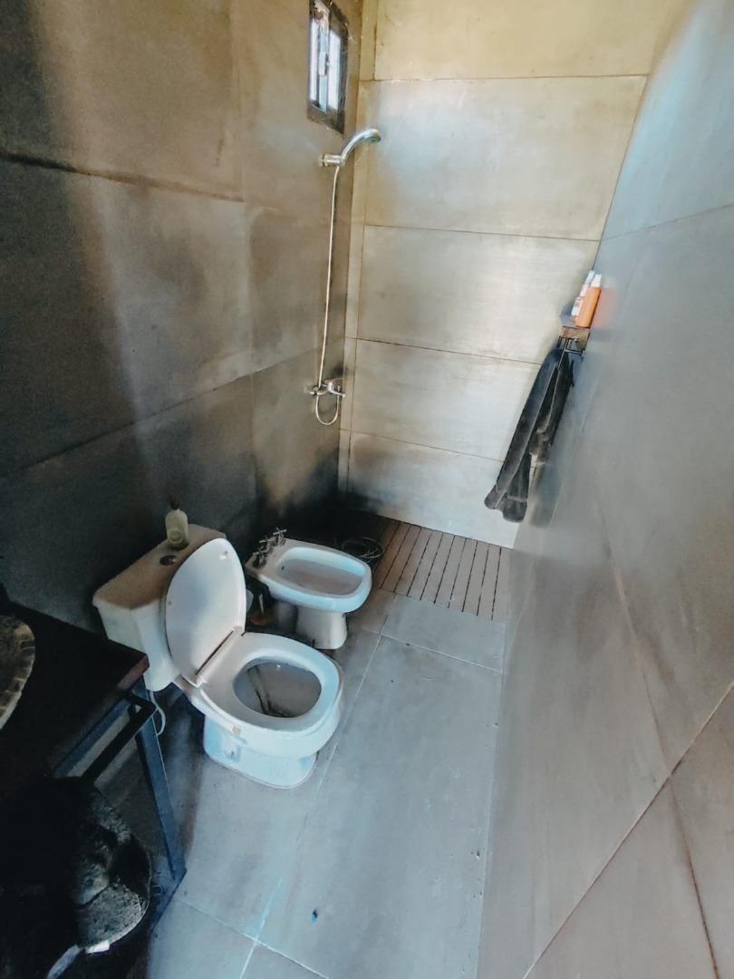 CASA UN DORMITORIO CON PILETA Y QUINCHO