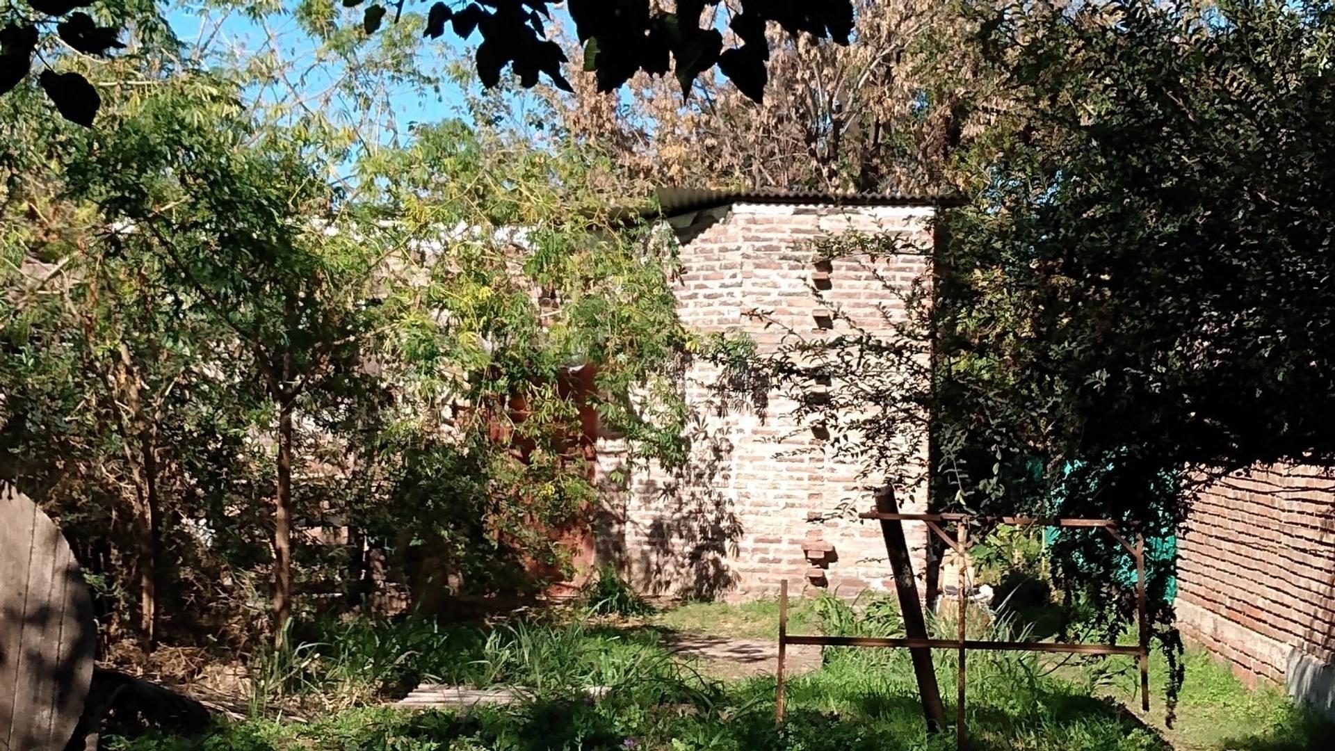 TERRENO URBANO CON CASA A TERMINAR