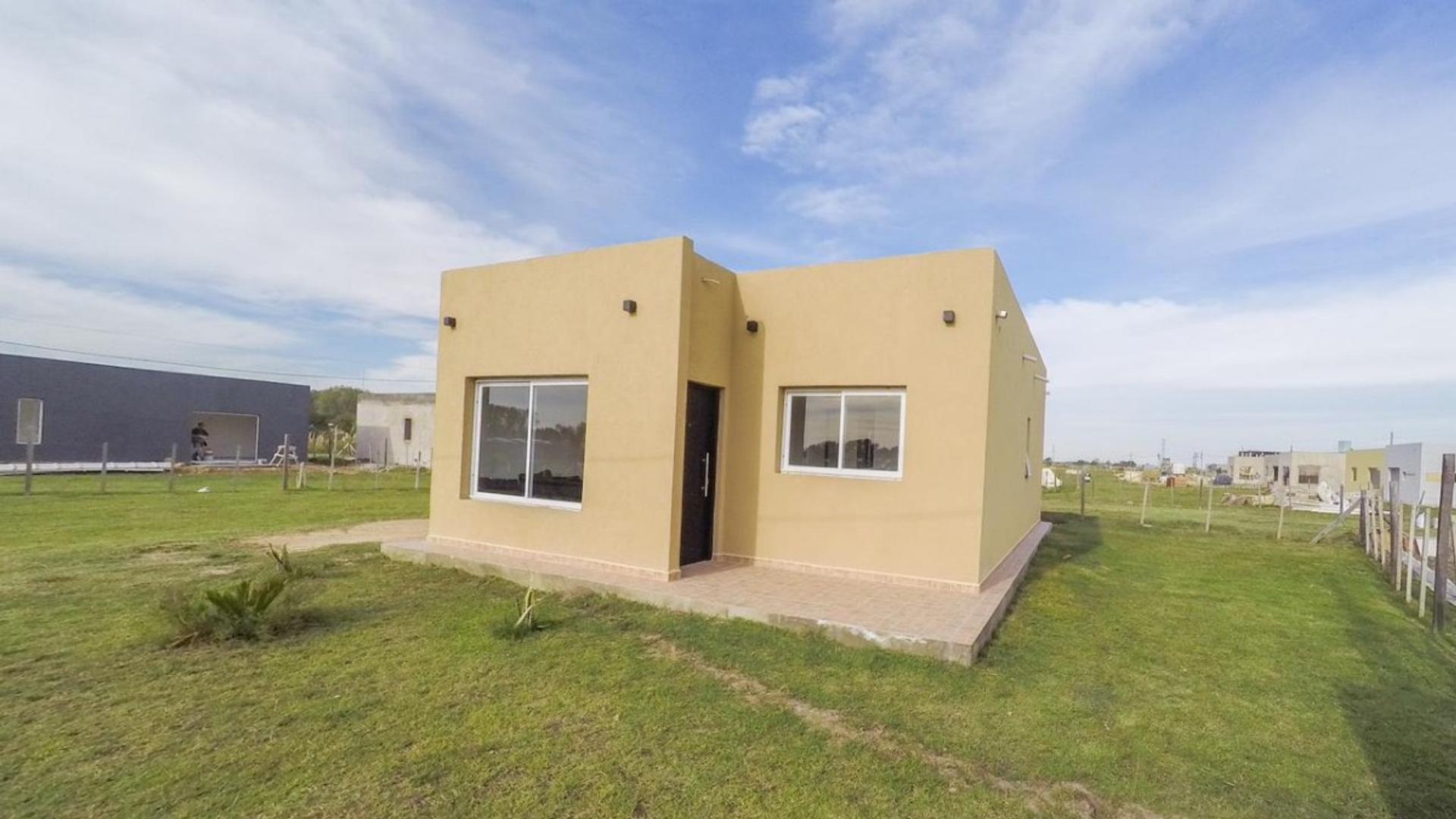 CASA EN VENTA A ESTRENAR 3 AMB. BARRIO PRIVADO LAGUNA AZUL 2