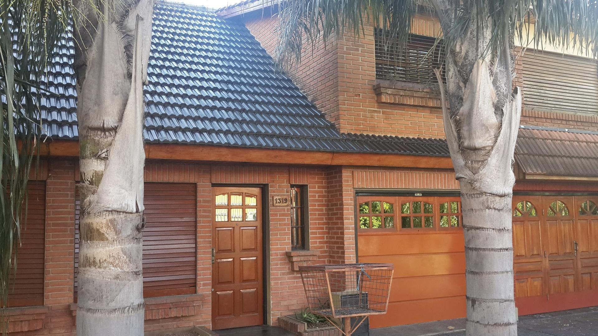 chalet fondo , garage y parrilla