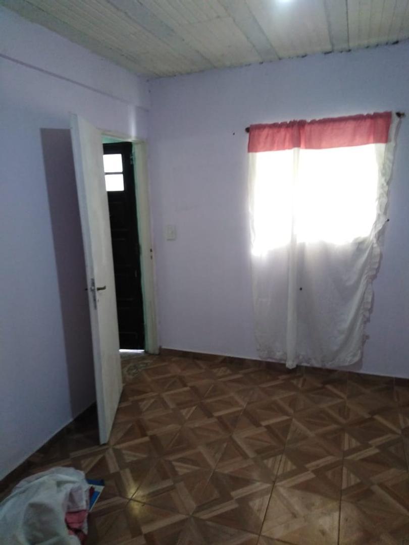 VENTA DE LOTE CON MEJORAS