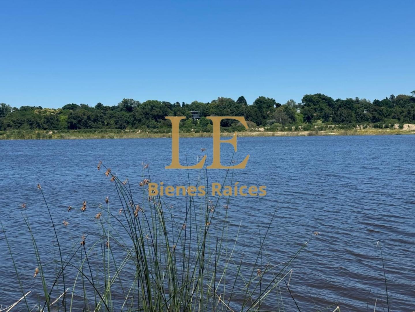 VENTA LOTE AL RIO CON AMARRA