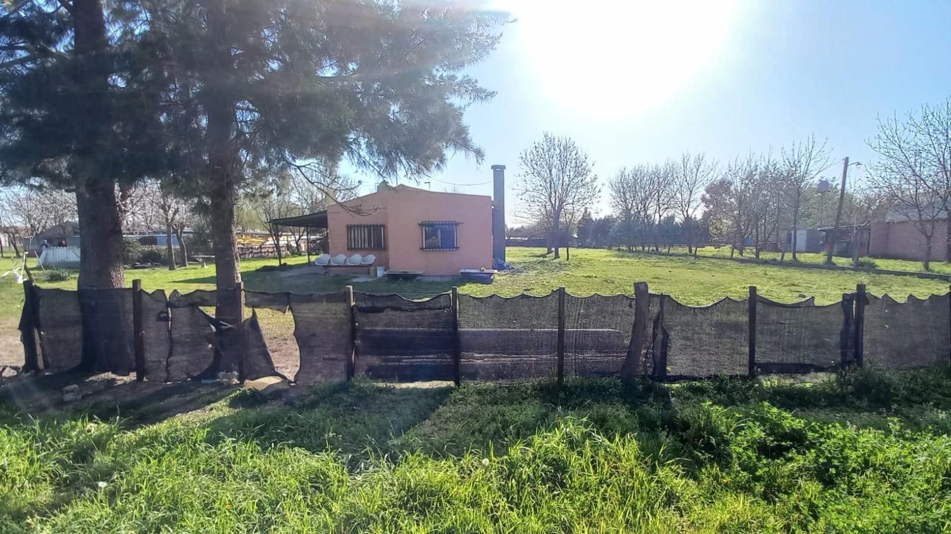 Terreno con casa y galpón en venta - La Capilla. Florencio V