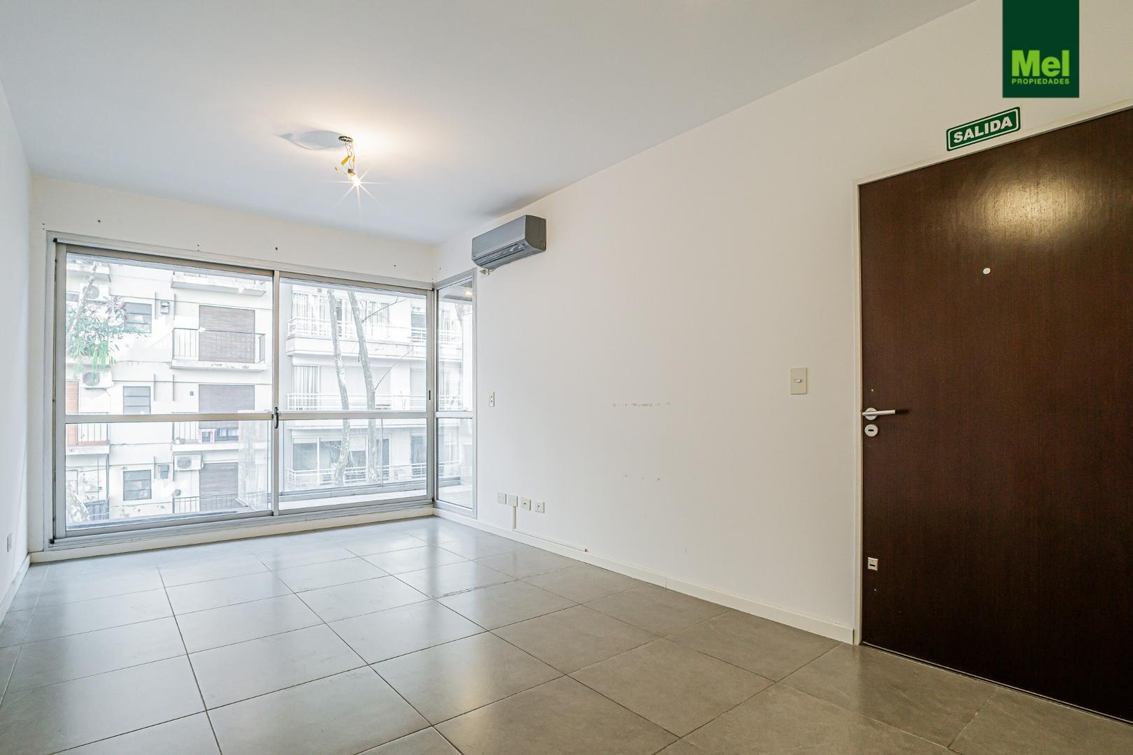 2 ambientes con Balcón y Parrilla, Cochera exclusiva.