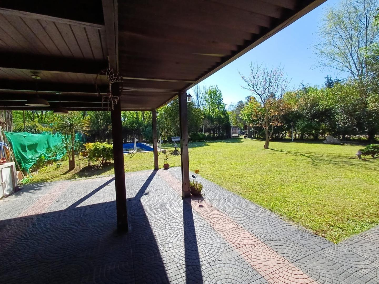 VENTA CASA EN FUNES CON PILETA Y DOS DORMITORIOS