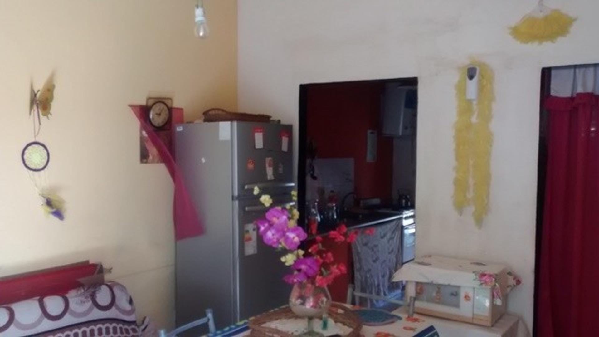 Casa 2 ambientes con 1 baño