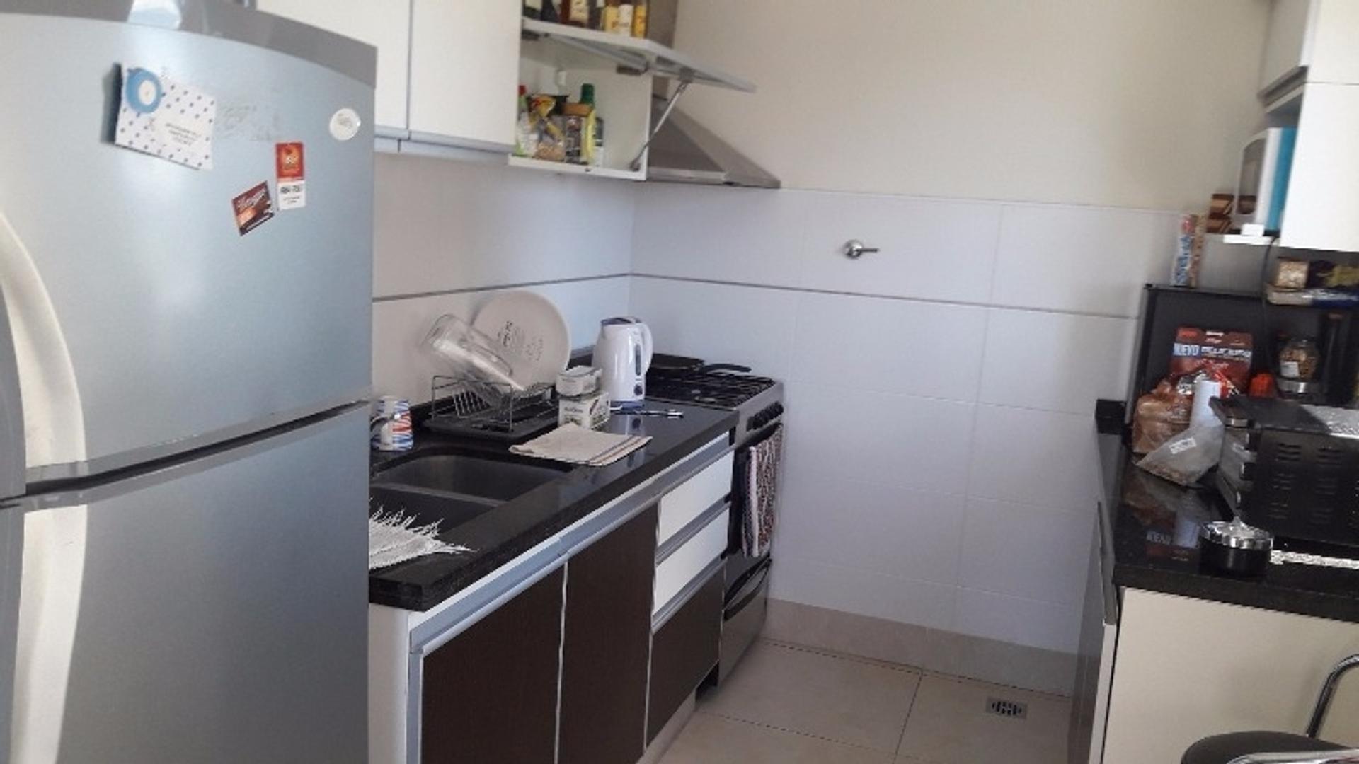 DEPTO. 3 AMBIENTE CON COCHERA CUBIERTA EN EL CENTRO DE MUÑIZ