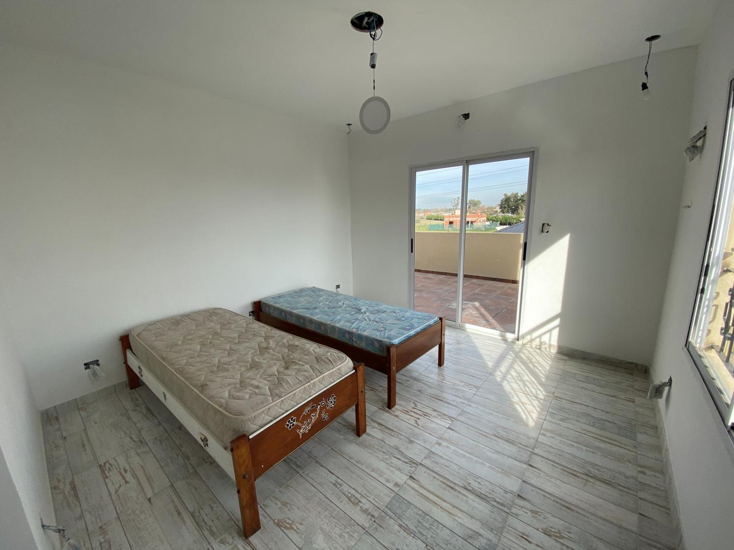 Casa a estrenar en Barrio Laguna Azul - Carlos Spegazzini