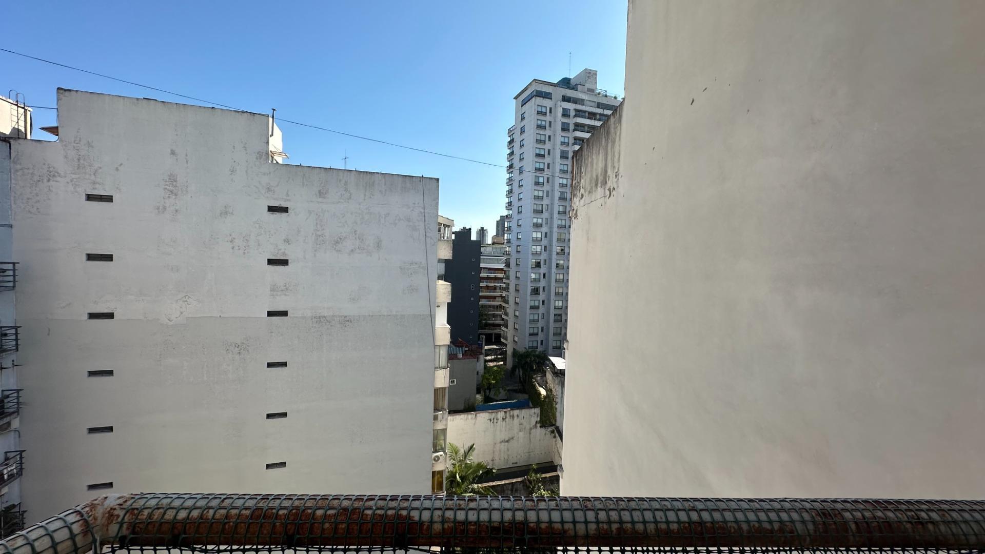 1 amb edificio con piscina y parrilla de uso común.