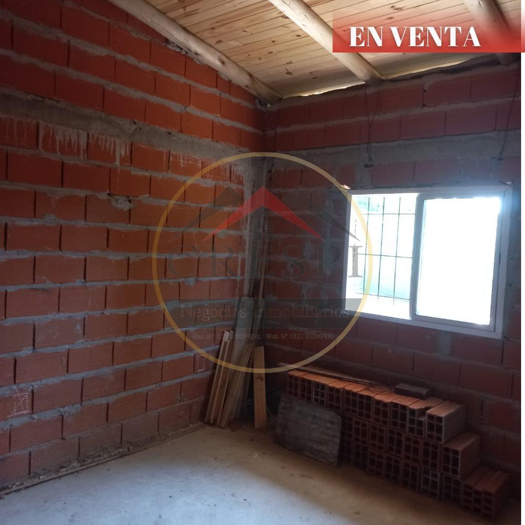 Casa  dos Dormitorios + Construcción a terminar.